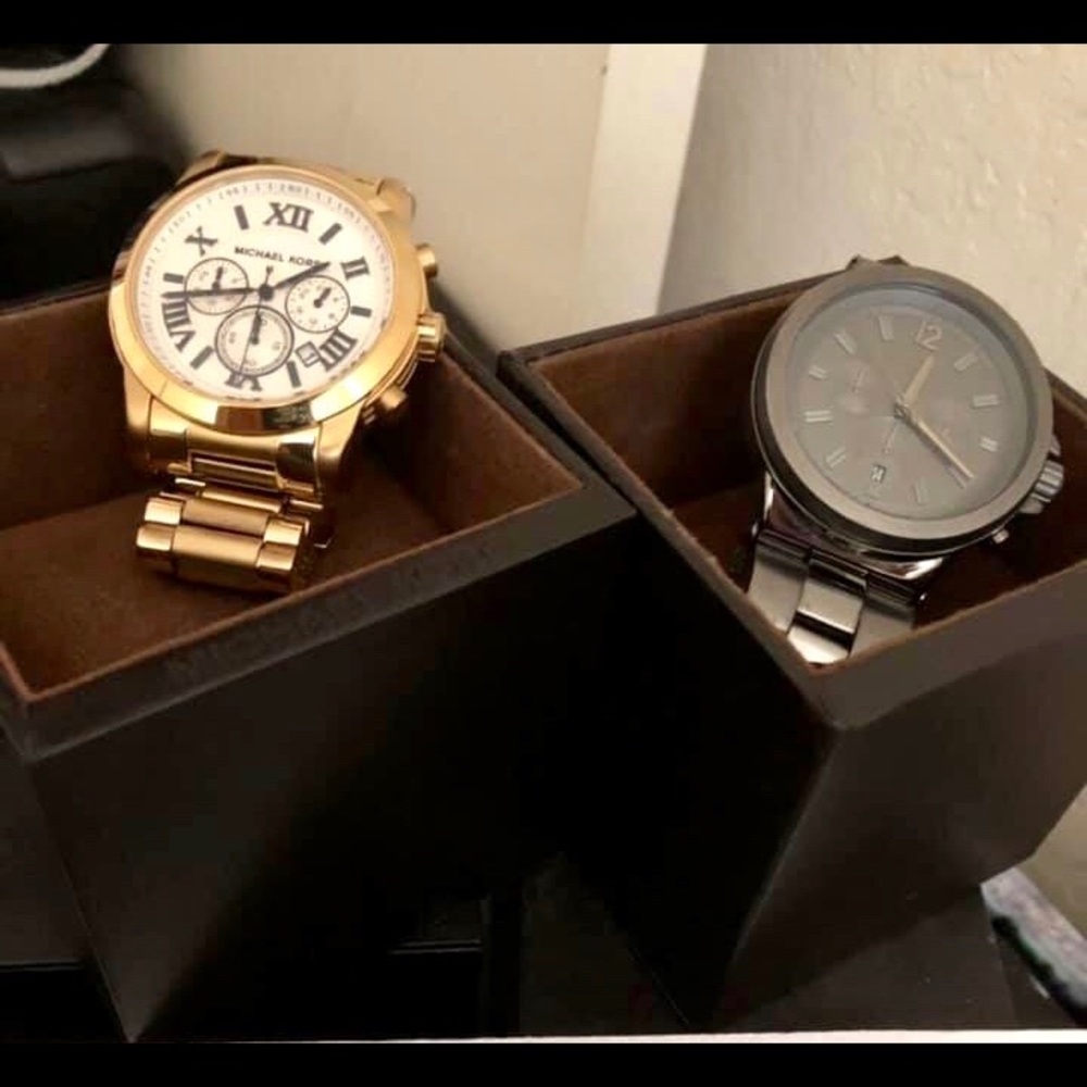 A pair of Michael Kors watches